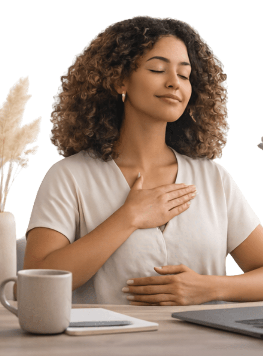 A professional practicing a grounding exercise with one hand on the chest during a Workday Exhale session designed for workplace stress relief in Georgia (30097, 30005, 30075, 30004).